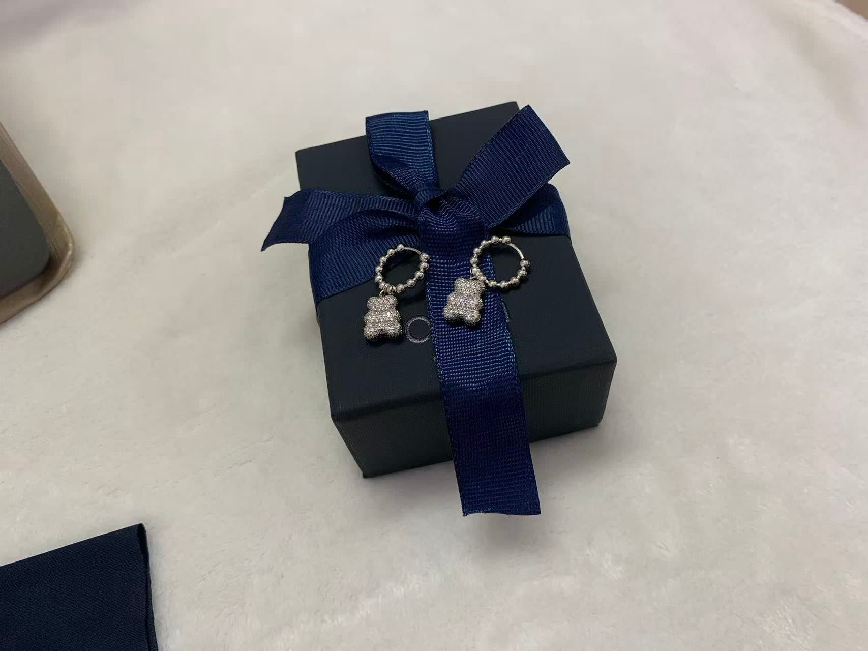 APM Monaco Silver Bear Earrings with Blue and Clear Stones